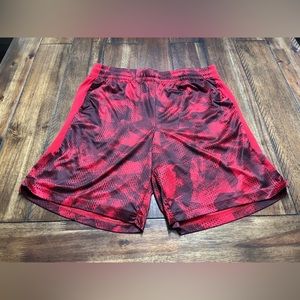 Red activewear shorts. With drawstrings in the front.